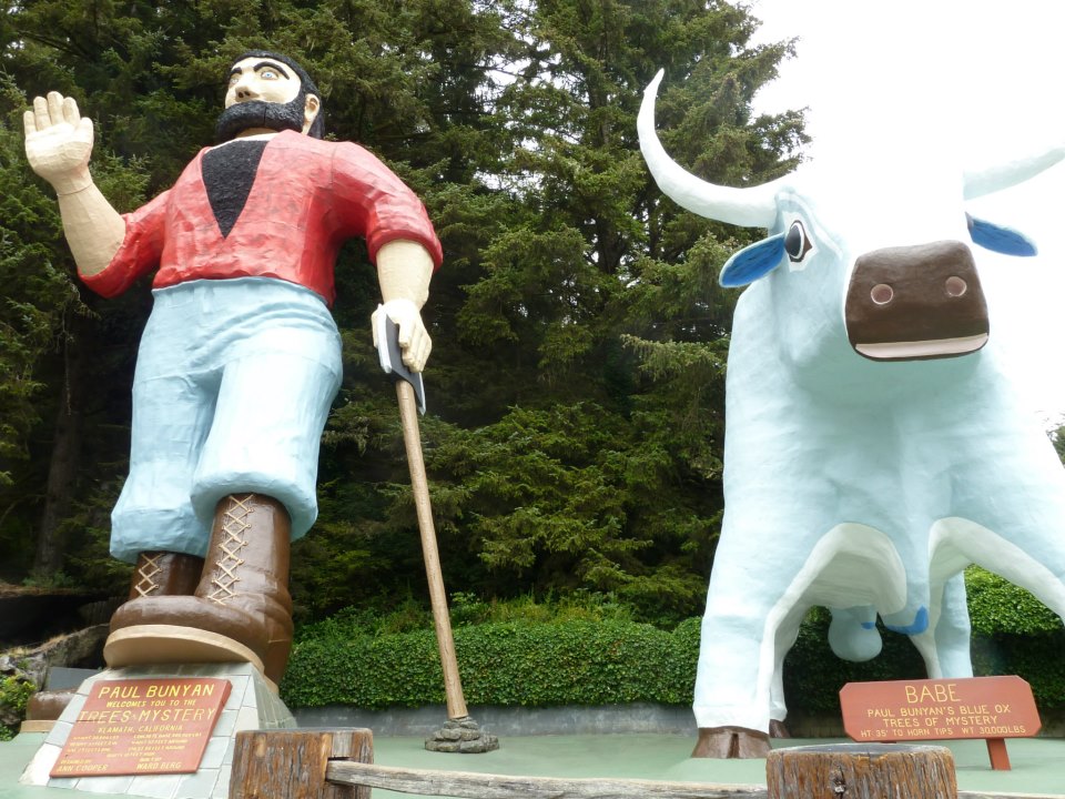 A huge statue of Paul Bunyan and his sidekick bull.